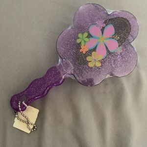 NWT Vintage Claire’s Purple Flower shaped kids brush